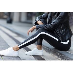 Spanx black faux leather leggings with white stripe